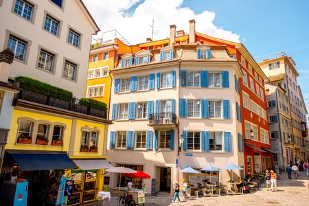 Zurich, Switzerland - June 28, 2016: Street view with cafes and colorful buildings in the old town of Zurich city in Switzerlandのeditorial素材