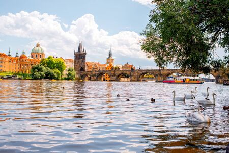 Citycsape view on the riverside with the bridge and old town in Pragueの写真素材