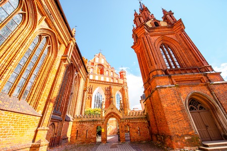 View on the beautiful gothic saint Anna and Francis of Assisi churches in the old town of Vilnius city, Lithuania.の写真素材
