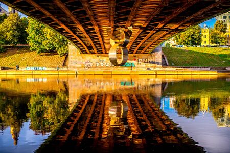 Vilnius, Lithuania - September 21, 2016: View on the Green bridge with modern art sculpture in form of the chain in Vilnius.のeditorial素材