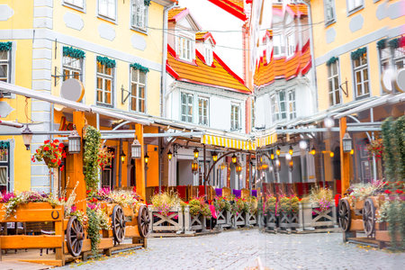 Beautiful buildings with reflection on Livu square in the old town of Riga, Latvia.