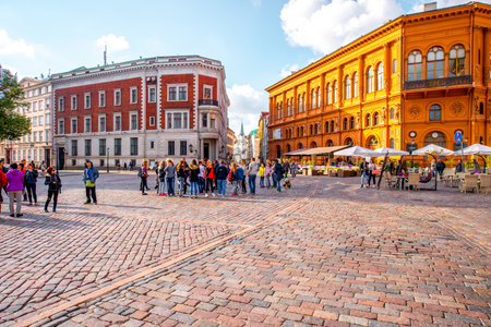 Riga, Latvia - September 22, 2016: Dome square with cafes and restaurants in the old town's center...