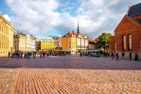 Riga, Latvia - September 22, 2016: Dome square with cafes and restaurants in the old town's center of Riga cityのeditorial素材