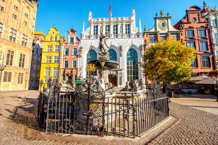 View on the famous Neptune fountain in the center of the old town of Gdansk, Poland