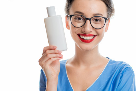 Cosmetologist with bottleの写真素材