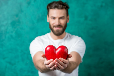 Man with red heart