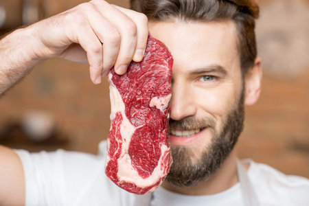 Man with meatの写真素材
