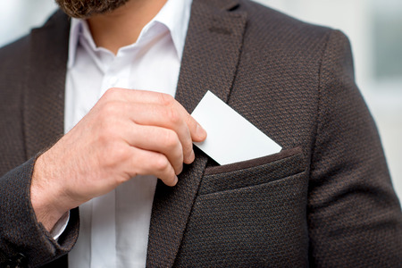 Man with business cardの写真素材