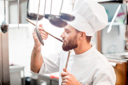 Chef cook at the kitchenの写真素材