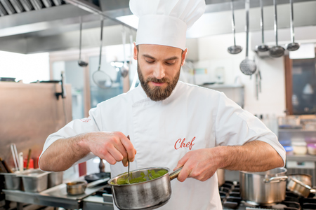 Chef cook at the kitchenの写真素材