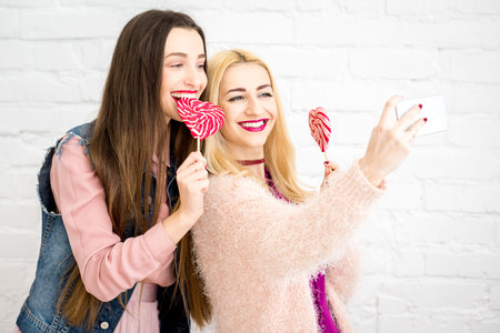 Friends making selfie photo