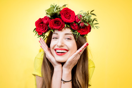 Colorful portrait of a woman with flower wreathの写真素材