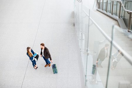 Business couple at the airportの写真素材