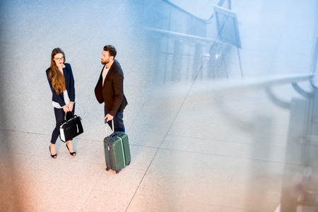Business couple at the airportの写真素材