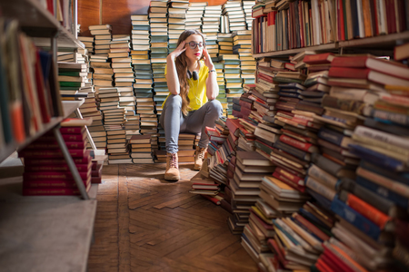 Student at the libraryの写真素材