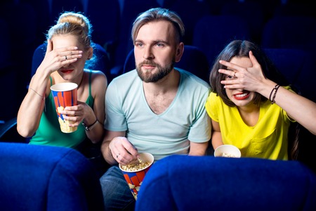 Friends in the cinemaの写真素材