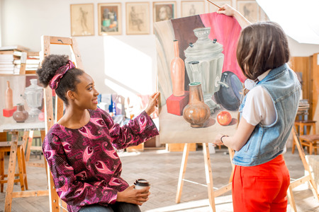 Creative students at the painting studioの写真素材