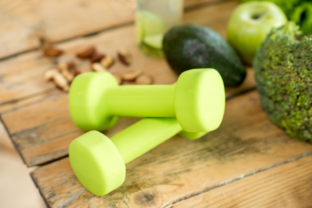 dumbbells with healthy foodの写真素材