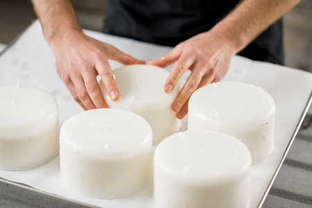Man making cheese