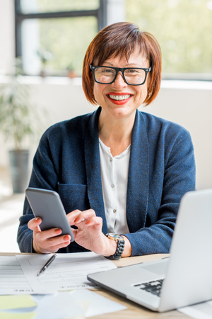 Senior businesswoman at the officeの写真素材