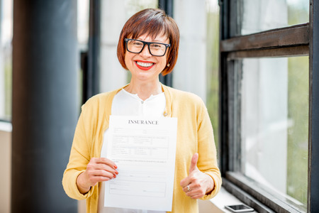 Older woman with insuranceの写真素材