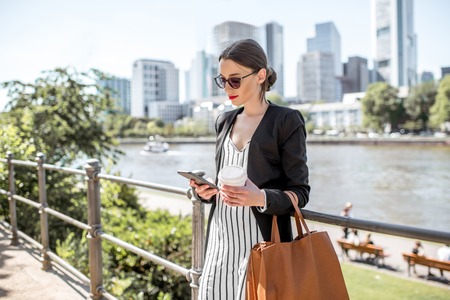 Businesswoman outdoors in the modern cityの写真素材