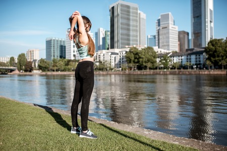 Woman exercising in Frankfurt cityの写真素材