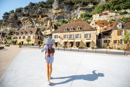 Woman traveling in La Roque Gageac village, Franceの写真素材