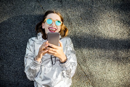 Lifestyle portrait of a modern woman outdoorsの写真素材