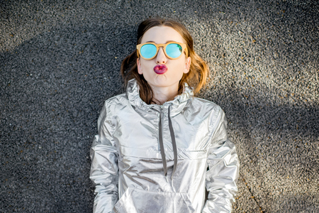 Lifestyle portrait of a modern woman outdoorsの写真素材