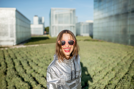 Woman at the modern greenhouseの写真素材