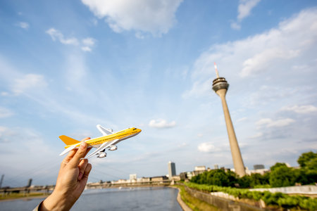 Airplane on the Dusseldorf city background