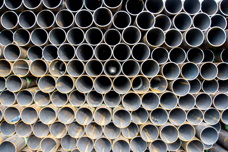 Pile of rusty pipesの写真素材