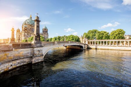 Sunrise view on the riverside with Dom cathedral and bridge in the old town of Berlin cityの写真素材