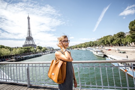 Woman walking in Parisの写真素材
