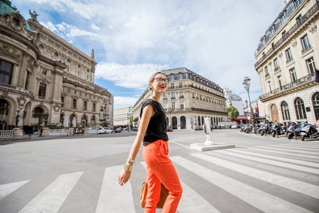 Woman walking in Parisの写真素材