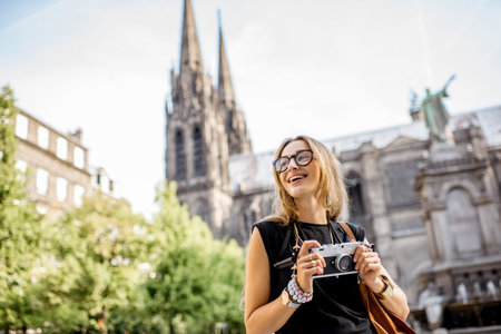 Woman traveling in Clermont-Ferrand city in France