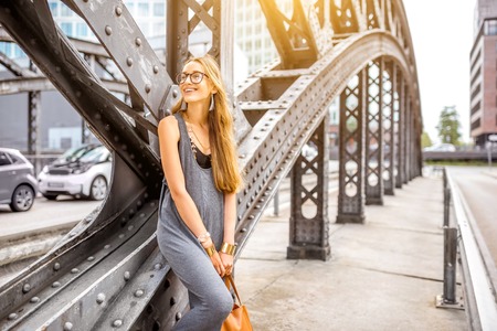Woman portrait on the iron bridgeの写真素材