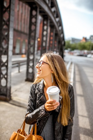 Business woman on the iron bridgeの写真素材