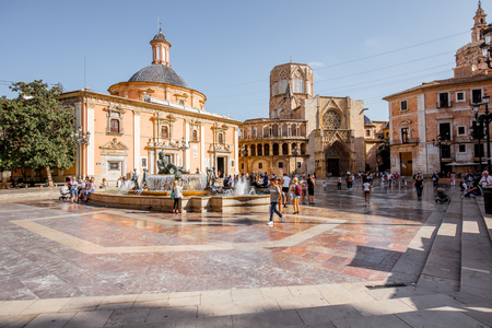 VALENCIA, SPAIN - August 18, 2017: View on the Virgen square crowded with people and cathedral of the Assumption of Our Lady in Valencia city, Spainのeditorial素材