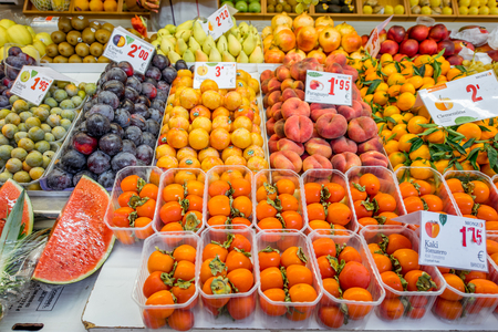 VALENCIA, SPAIN - August 19, 2017: Store with food at the central market located in across from the Llotja de la Seda and the church of the Juanes in Valencia cityのeditorial素材
