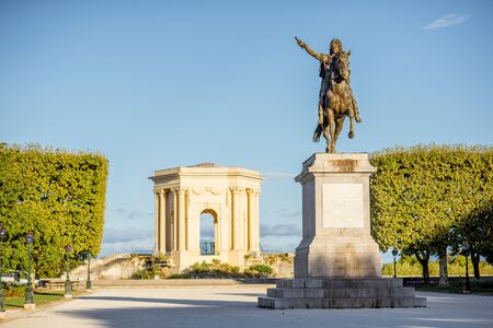 View on the beautiful Peyrou promenade with Louis statue and pavillon in Montpellier city during the morning light in southern Franceの写真素材