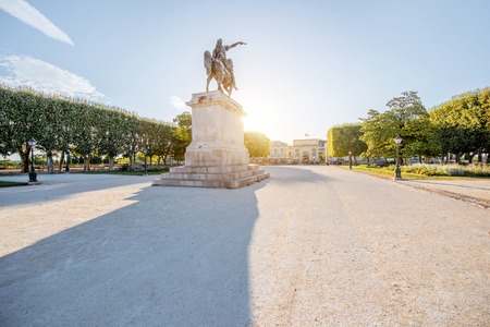 View on the beautiful Peyrou promenade with Louis statue in Montpellier city during the morning light in southern Franceの写真素材