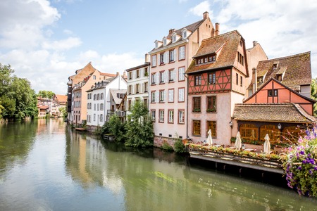 Landscape view on the water channel with beautiful half-timbered houses in Strasbourg city, Franceの写真素材