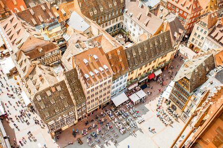 Top cityscape view on the cathedral square crowded with people in the old town of Strasbourg city, Franceの写真素材