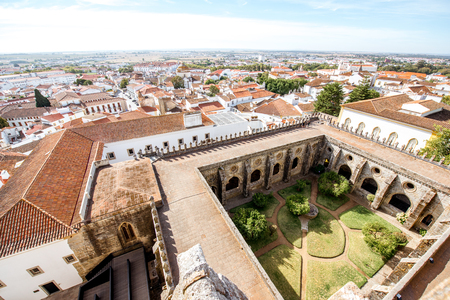 Top cityscape view on the old town with courtyard of the main cathedral in Evora town in Portugalの写真素材