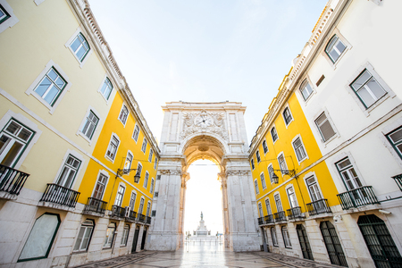 View on the Triumphal arch on the Commerce square during the sunrise in Lisbon city, Portugalの写真素材