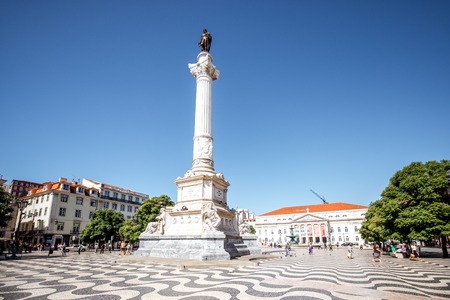 View on the Rossio square with column monument during the sunrise in Lisbon city, Portugalのeditorial素材