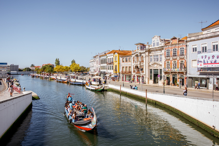 AVEIRO, PORTUGAL - September 26, 2017: View on the water channel with boats and colorful old buildings in Aveiro city in Portugalのeditorial素材