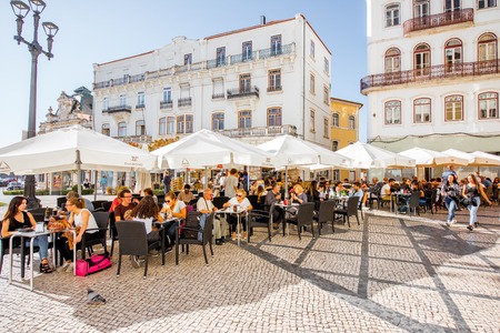 COIMBRA, PORTUGAL - September 26, 2017: View on the crowded with tourists street in the old town of Coimbra city, Portugalのeditorial素材